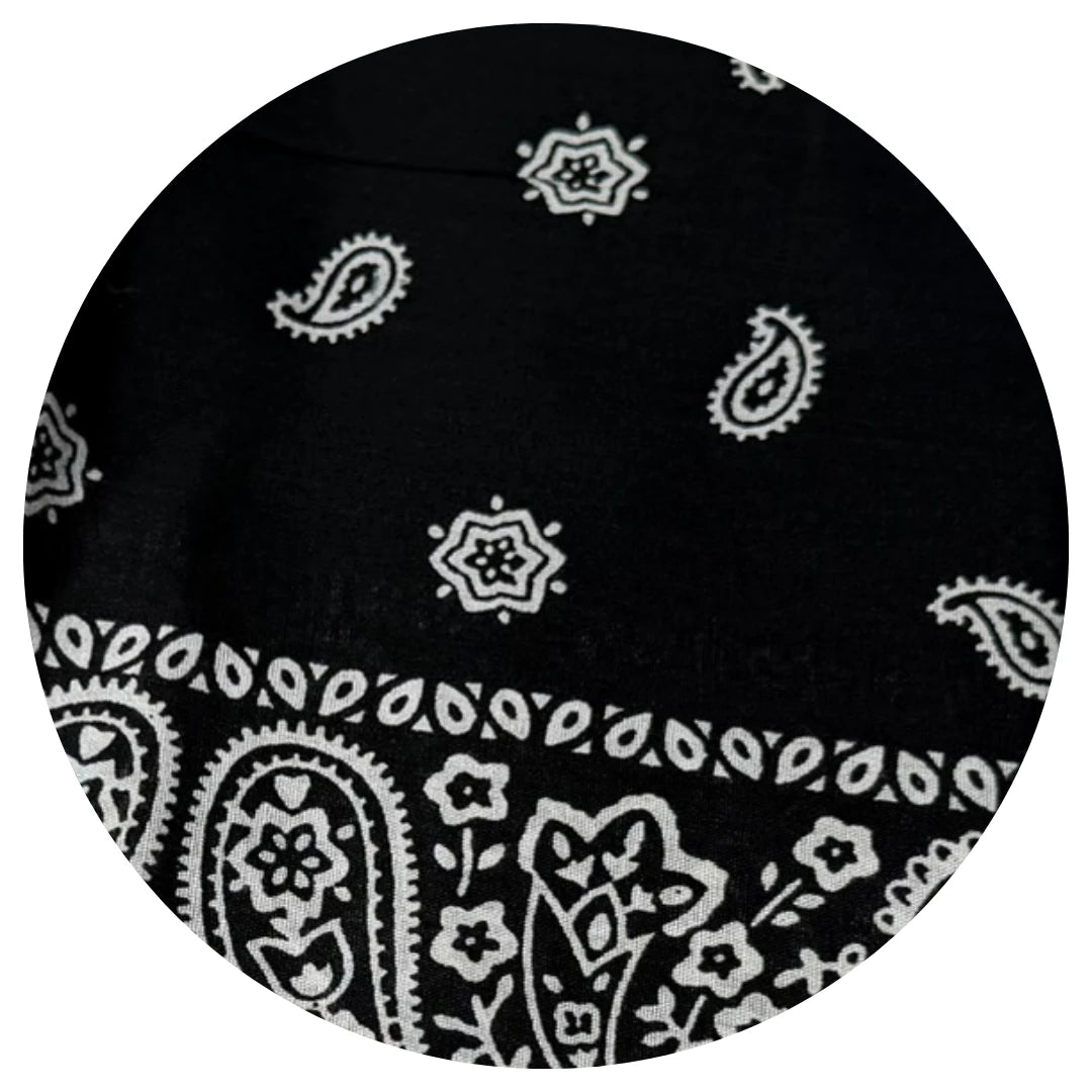 Black bandana with white paisley patterns