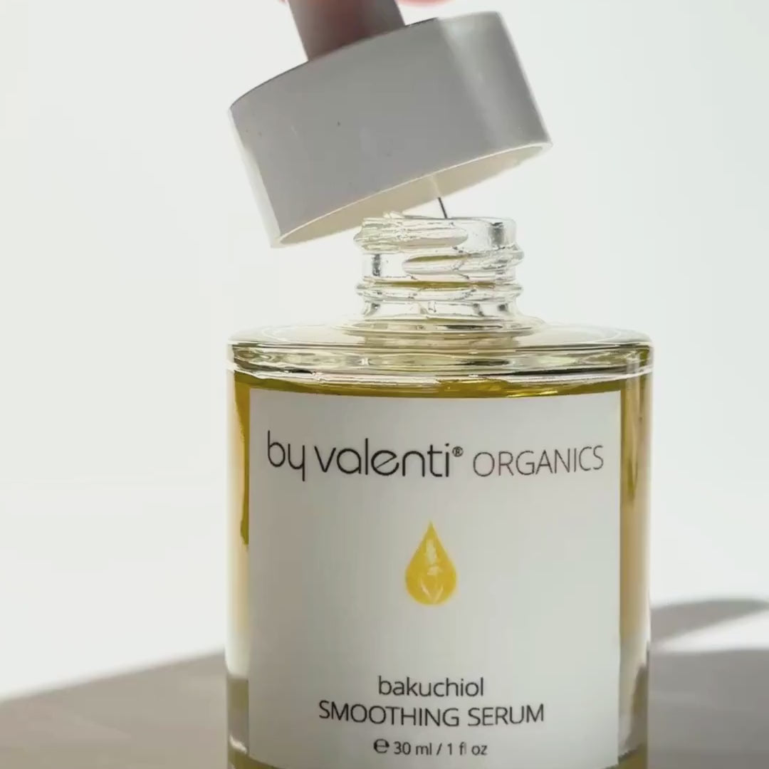 By Valenti Bakuchiol Smoothing Serum 30 ml glass bottle gold oil dripping in bottle